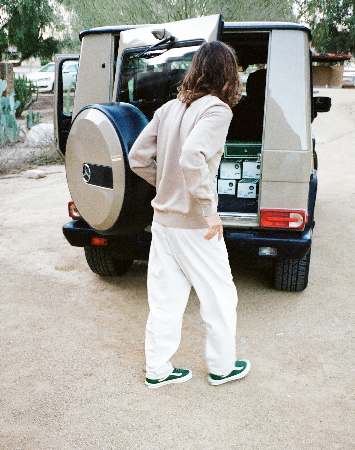 North West wearing Vans sneakers