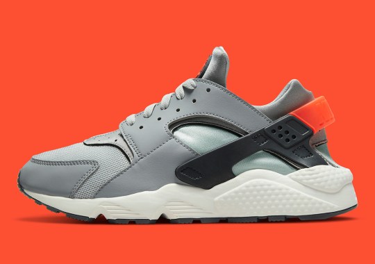A Pop Of Orange Dresses The Heel Of This Greyed Out Nike Air Huarache