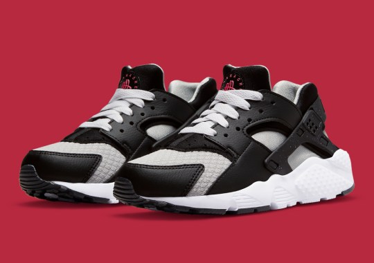 Red-Colored Logos Animate This “Black/Grey” Nike Air Huarache For Kids