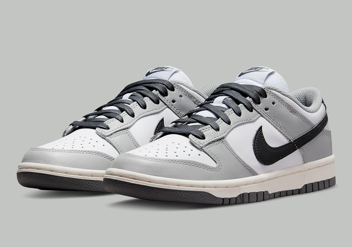 Nike Adds A Vintage Touch To This Grey-Dressed Dunk Low