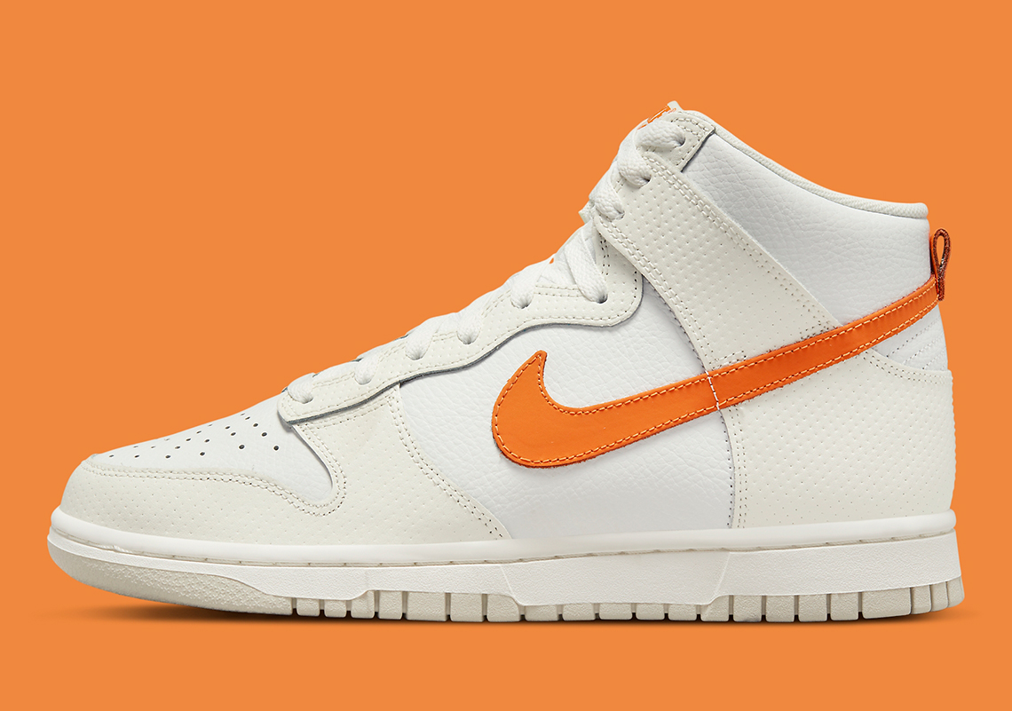 Orange Swooshes And Perforated Overlays Outfit This Latest Nike Dunk Low