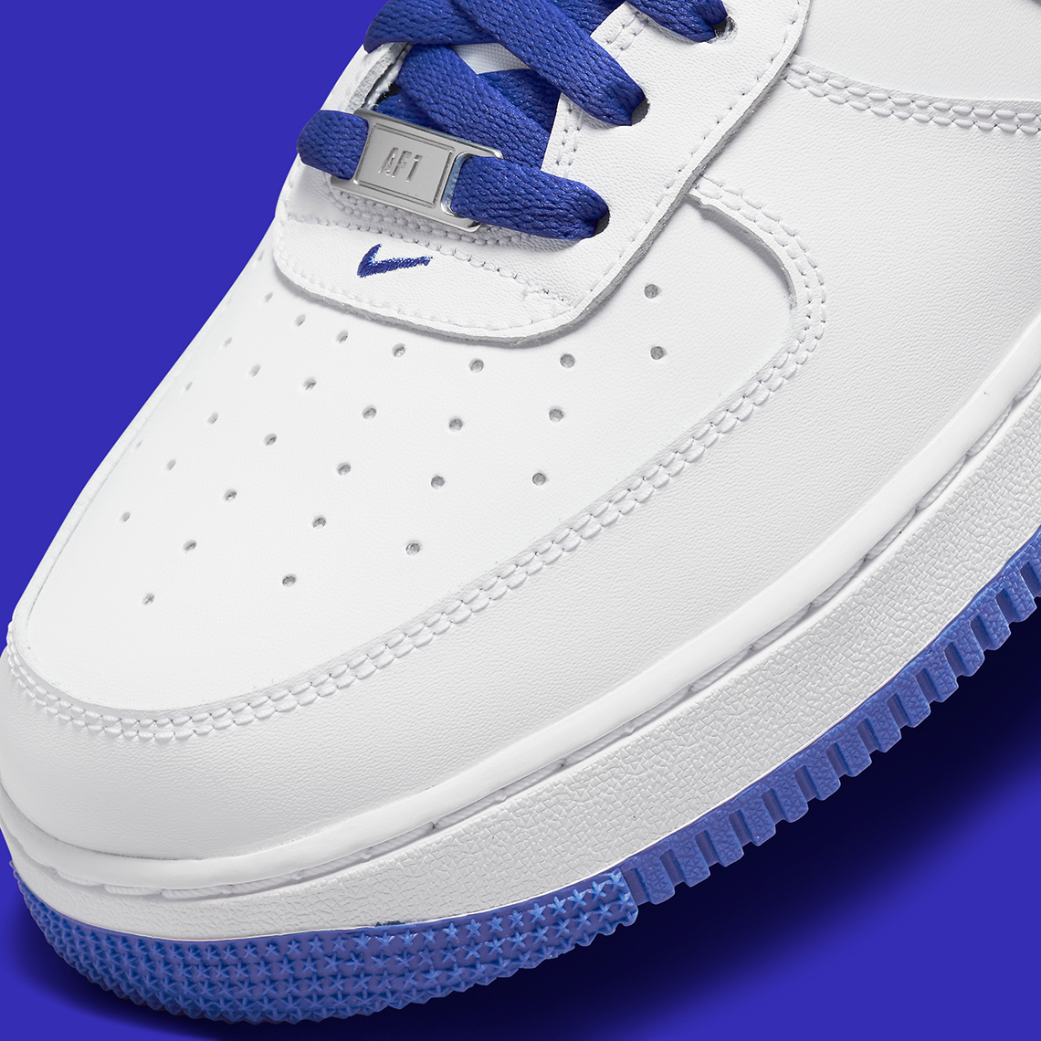 white air forces with blue swoosh