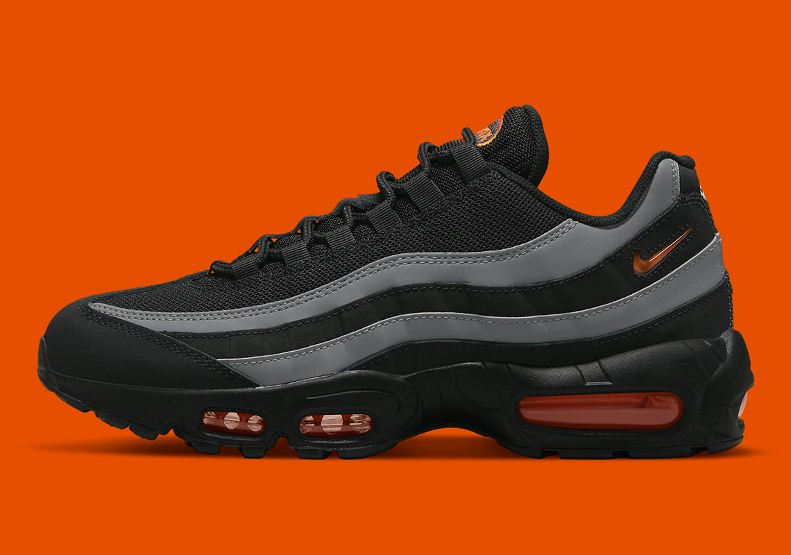 Jewel Swooshes Make A Cameo Along This Black, Grey, And Orange Nike Air Max 95