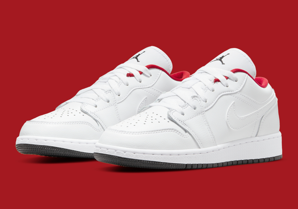 A Clean White And Red Color Combination Lands On This Kid’s Air Jordan 1 Low