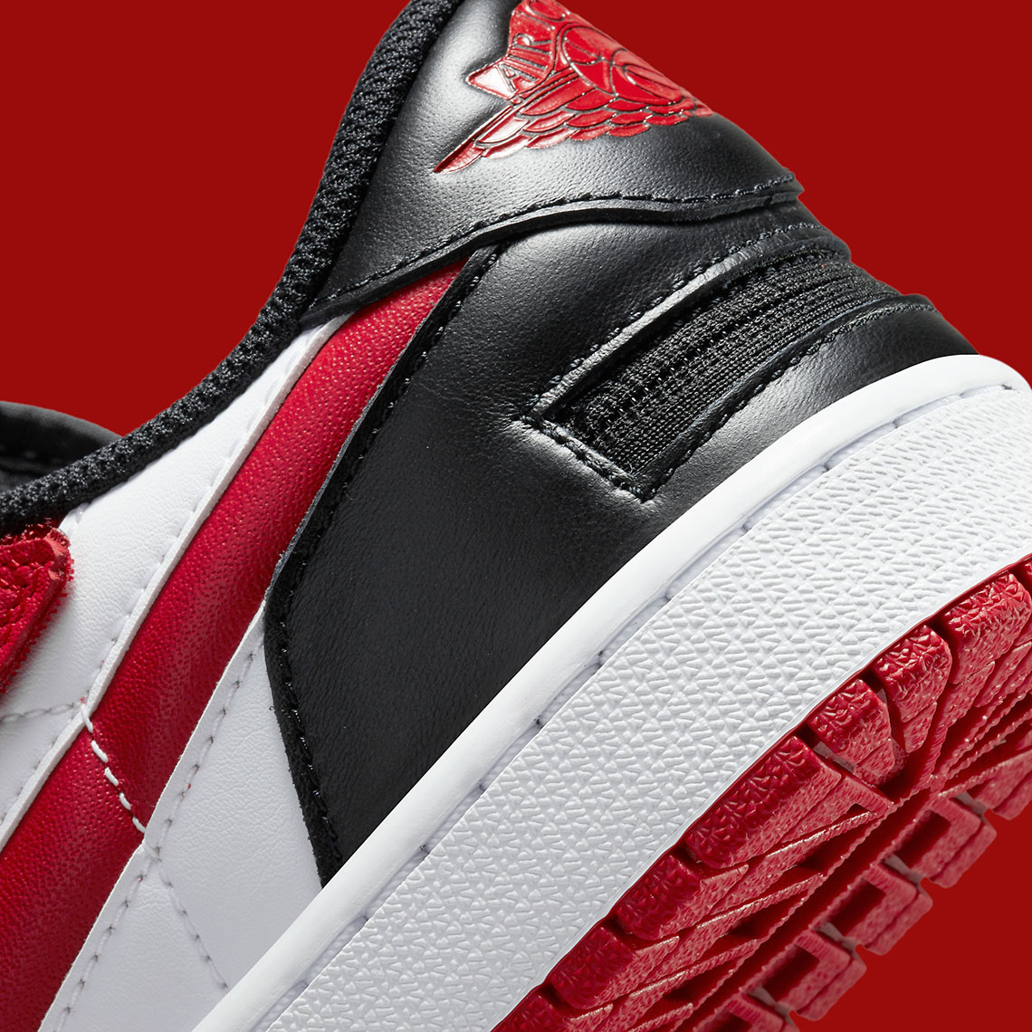 This Air Jordan 1 Low Gets A Clean Black Fire Red Makeup - Sneaker News