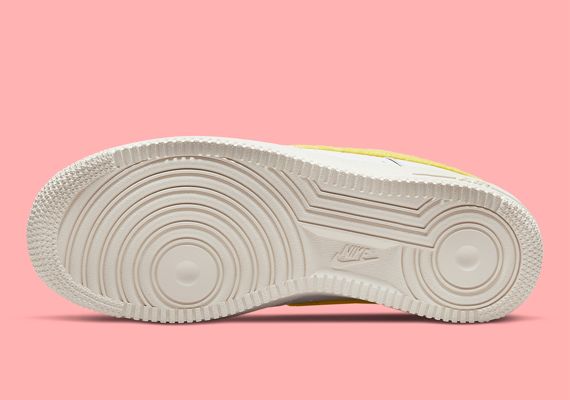 1 reimagined collection- Millennial pink Air Force ones with matching  ribbon laces. Not seen: …