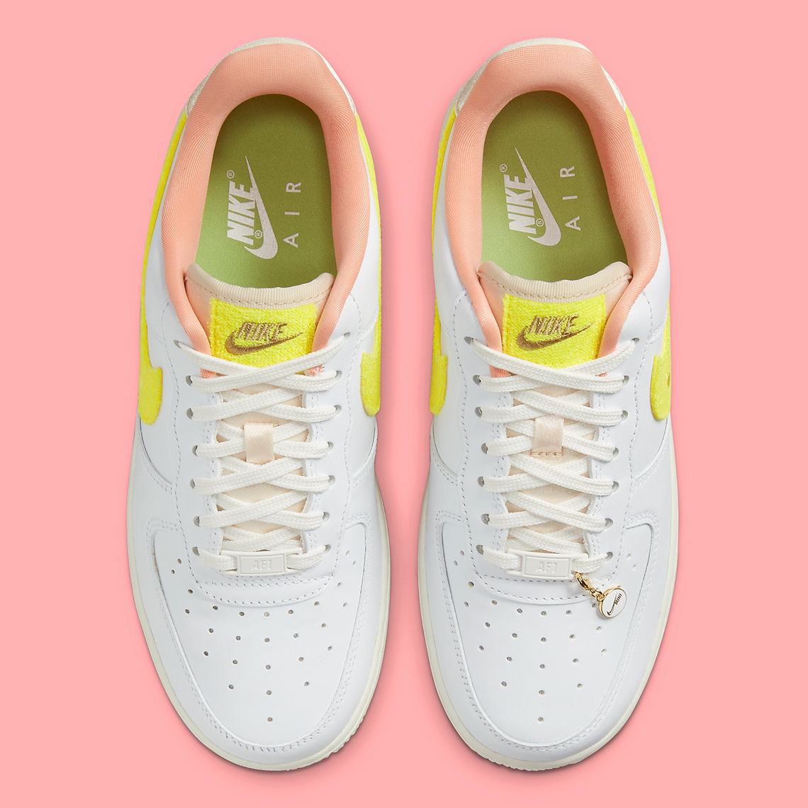 1 reimagined collection- Millennial pink Air Force ones with matching  ribbon laces. Not seen: …