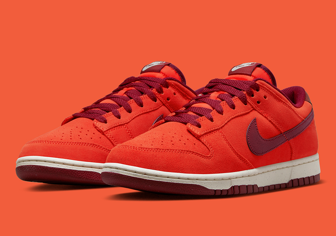The size Nike Dunk Low Appears In A Sunny Orange Colorway