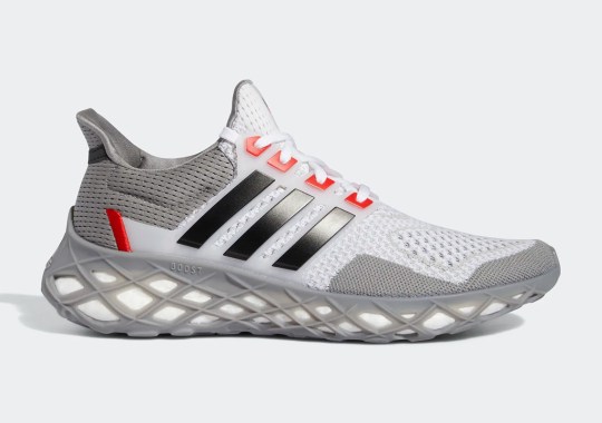 The adidas UltraBOOST Web DNA Pairs Grey One And Vivid Red