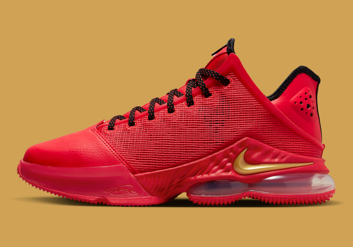 The white nike shoes with colored swoosh boots made “Light Crimson” Is Fit For A King