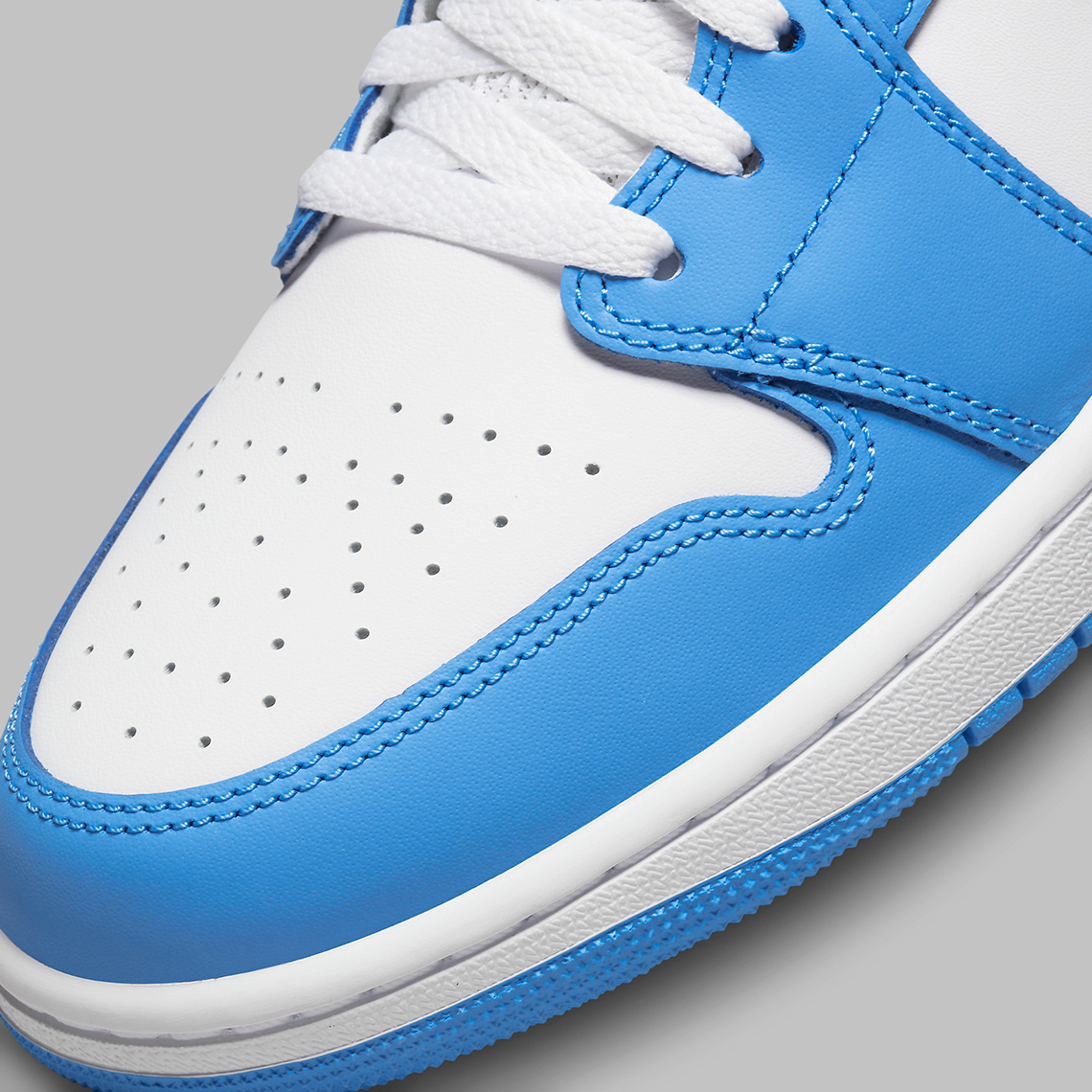 Air Jordan 1 Mid University Blue Grey DX9276-100 | SneakerNews.com