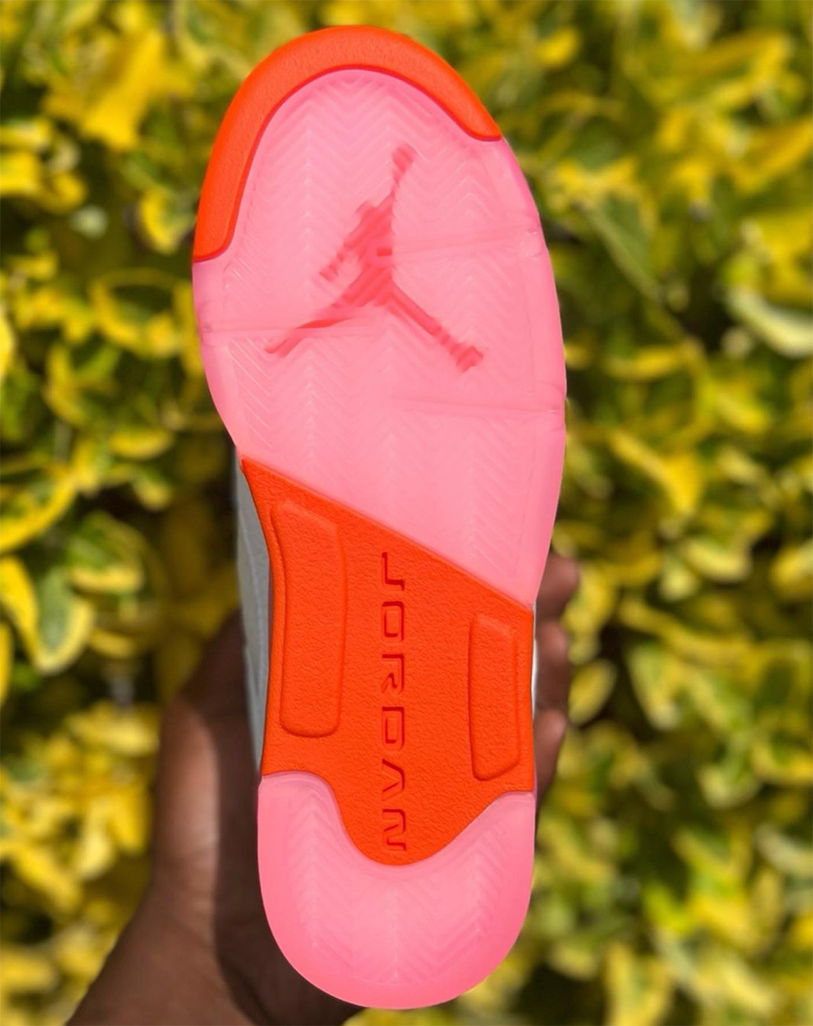 pink and orange jordan 5