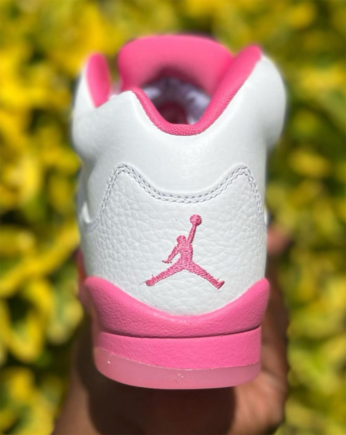 pink and white jordans 5