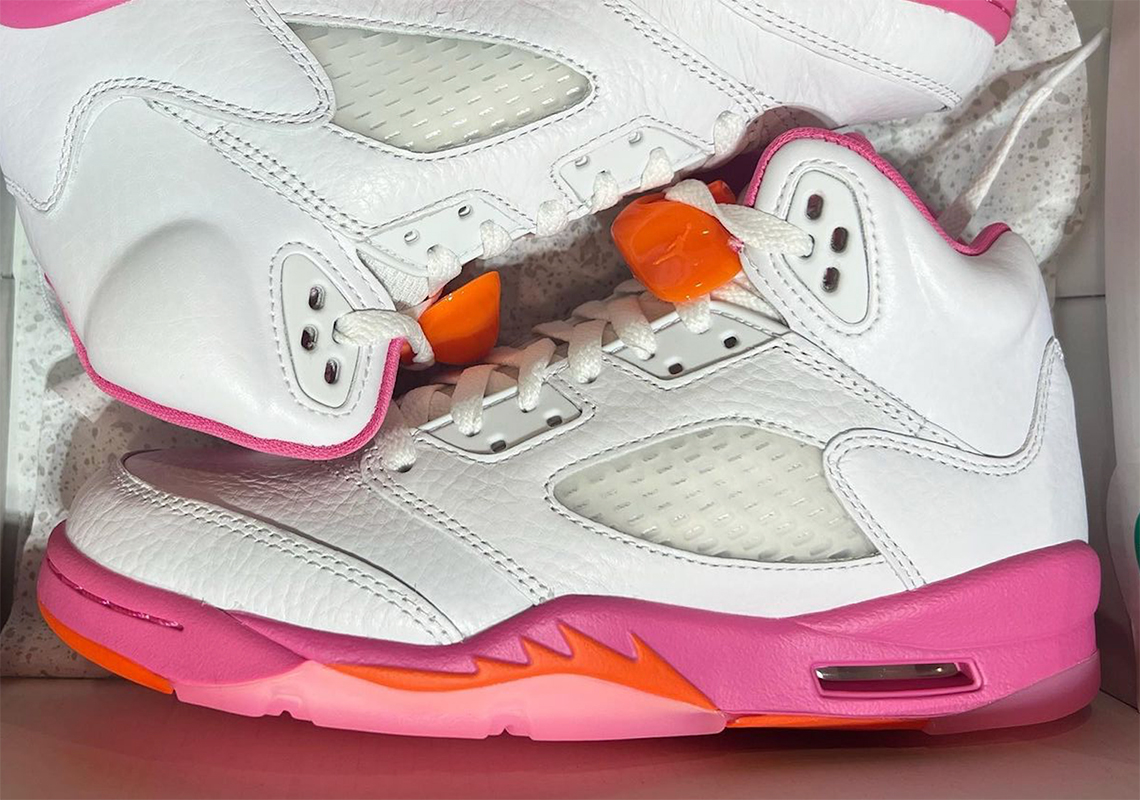 pink and white jordan 5