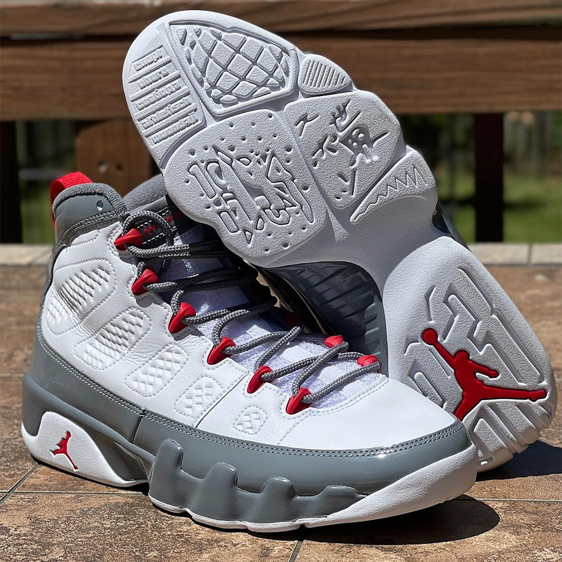 grey and white jordan 9