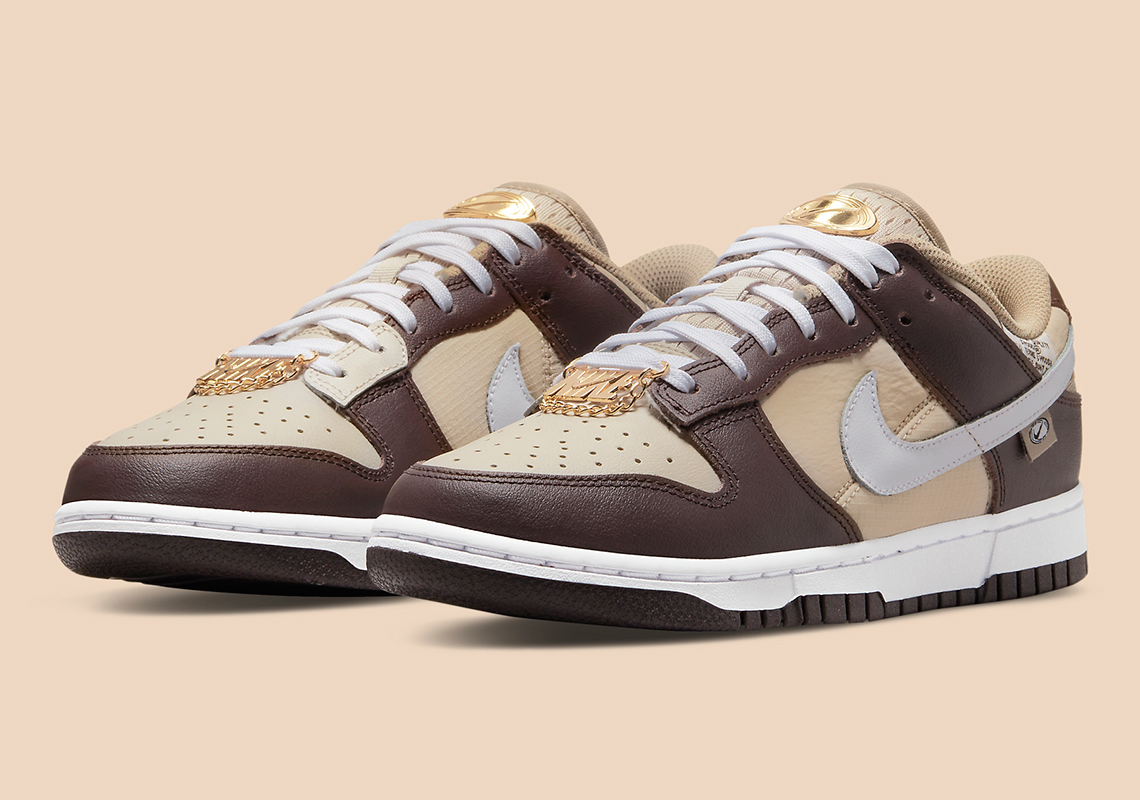 Gold Accessories And Shades Of Brown Come Together On This Nike Dunk Low