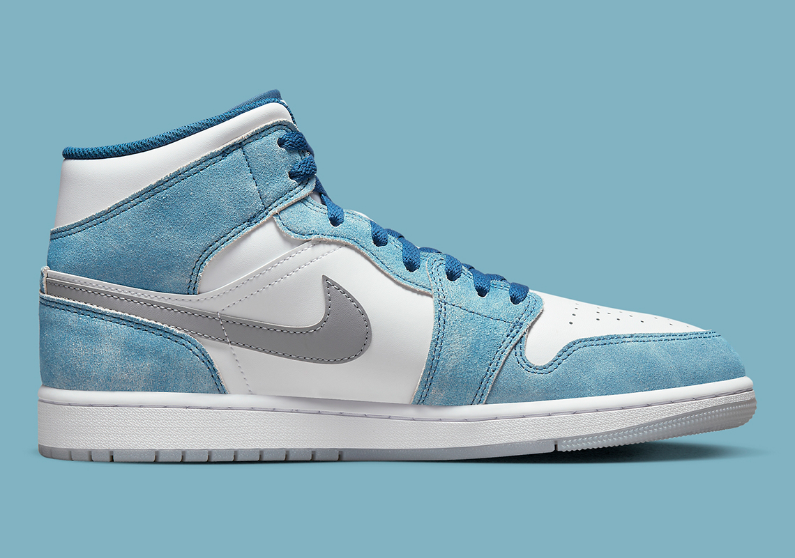 grey jordan 1 with blue swoosh