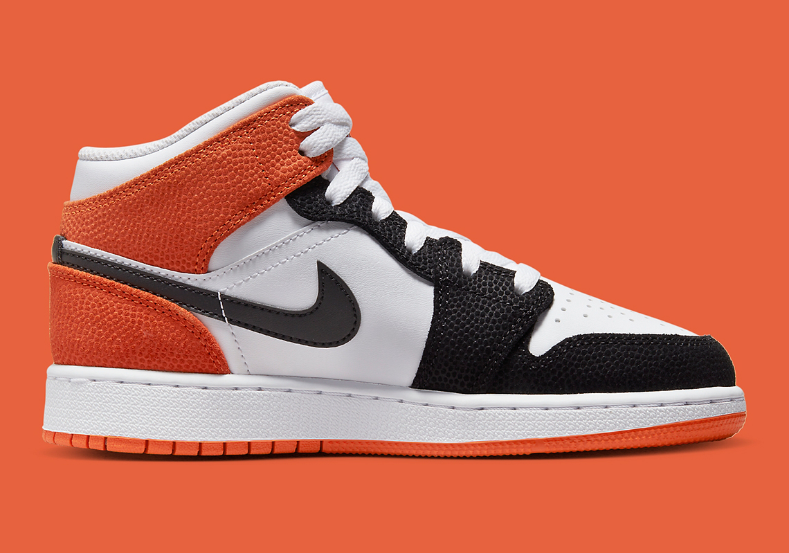 black and white and orange jordan 1