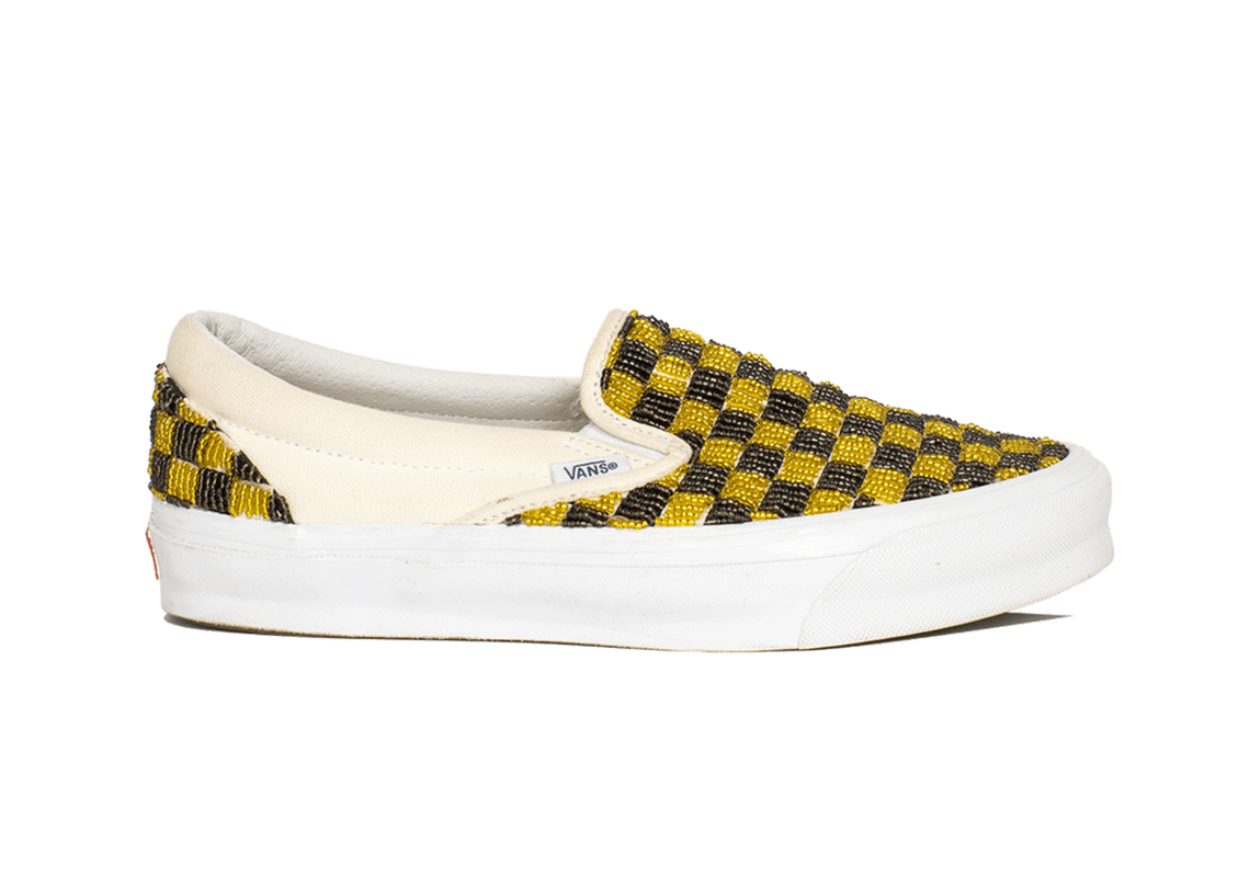 black and yellow slip on vans