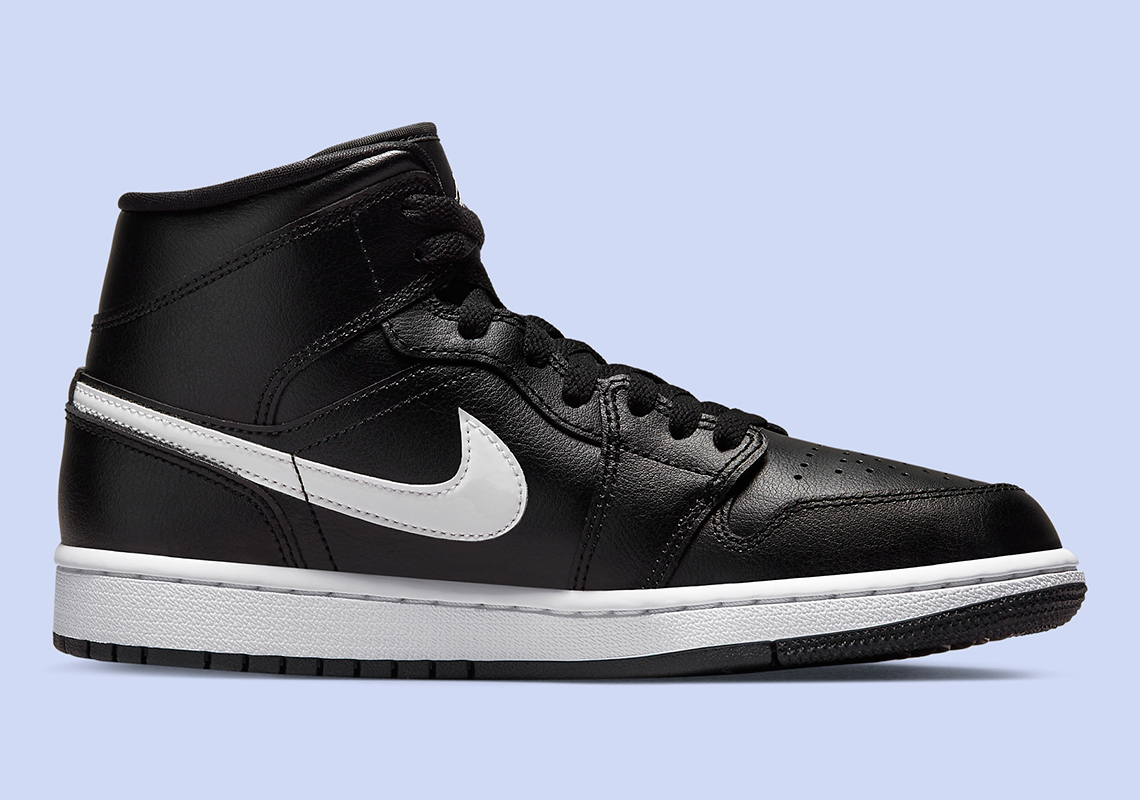 black jordan 1 white swoosh