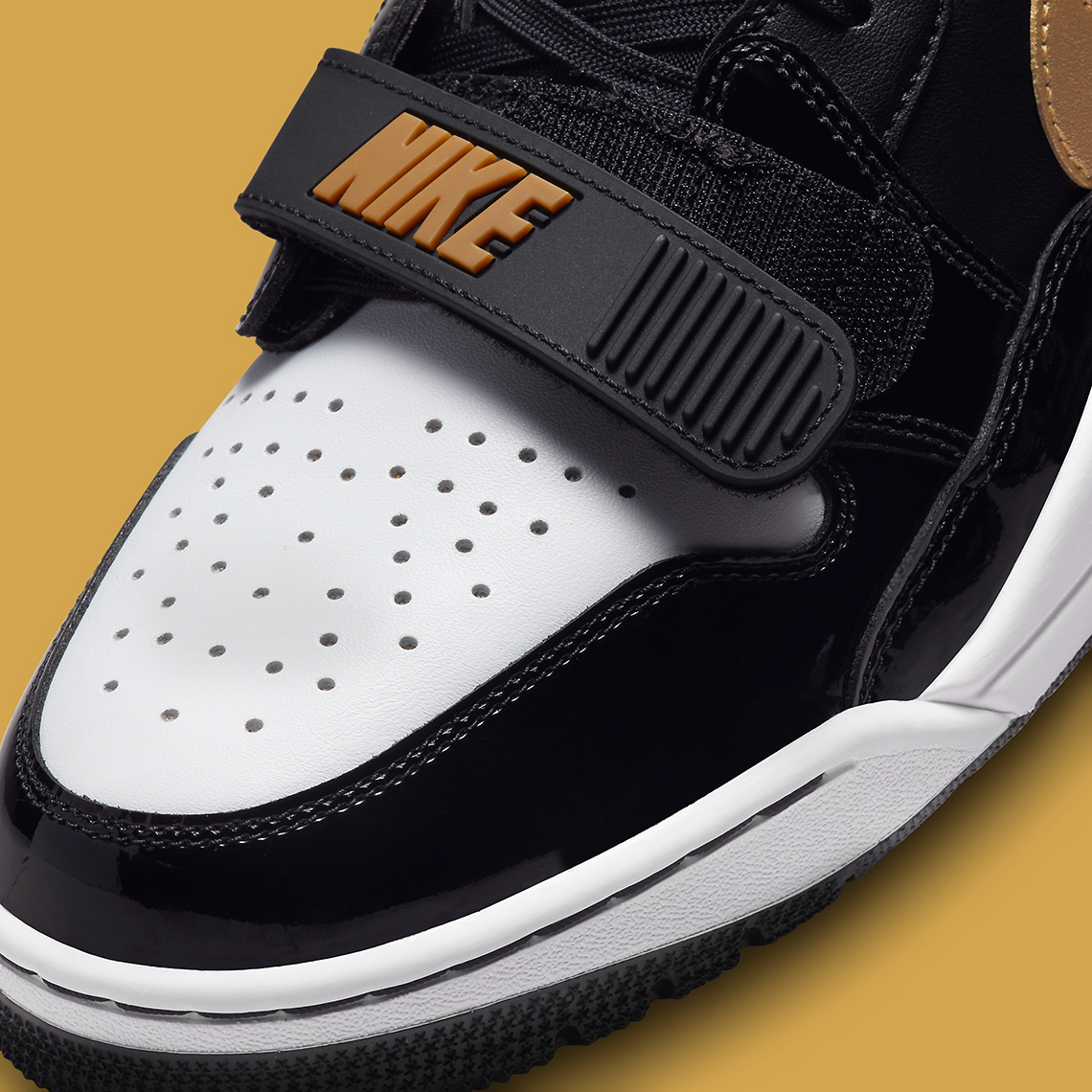 Patent Black And Gold Emerge On The Jordan Legacy 312 Low | LaptrinhX ...