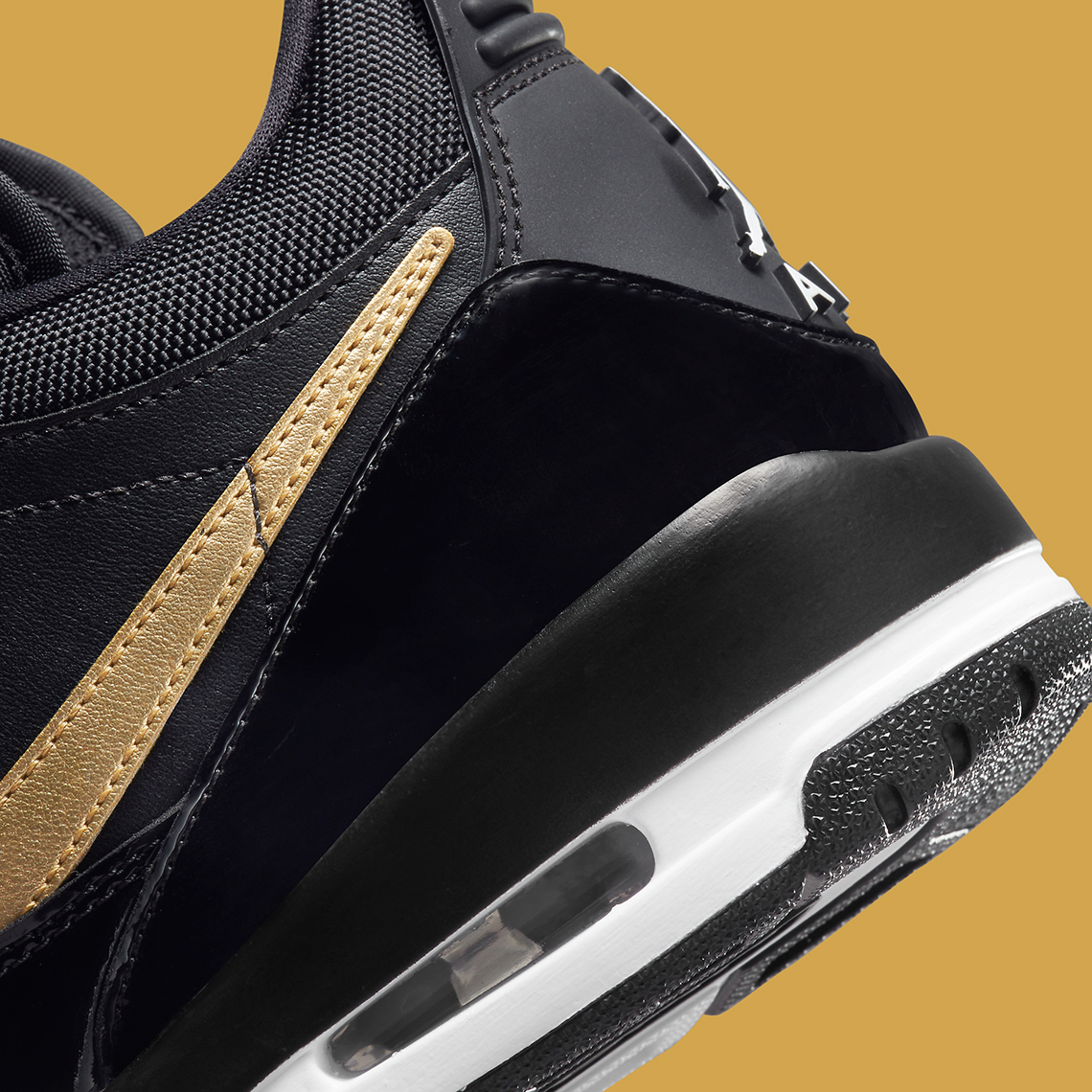 Jordan Legacy 312 Low Black Gold CD7060-071 | SneakerNews.com