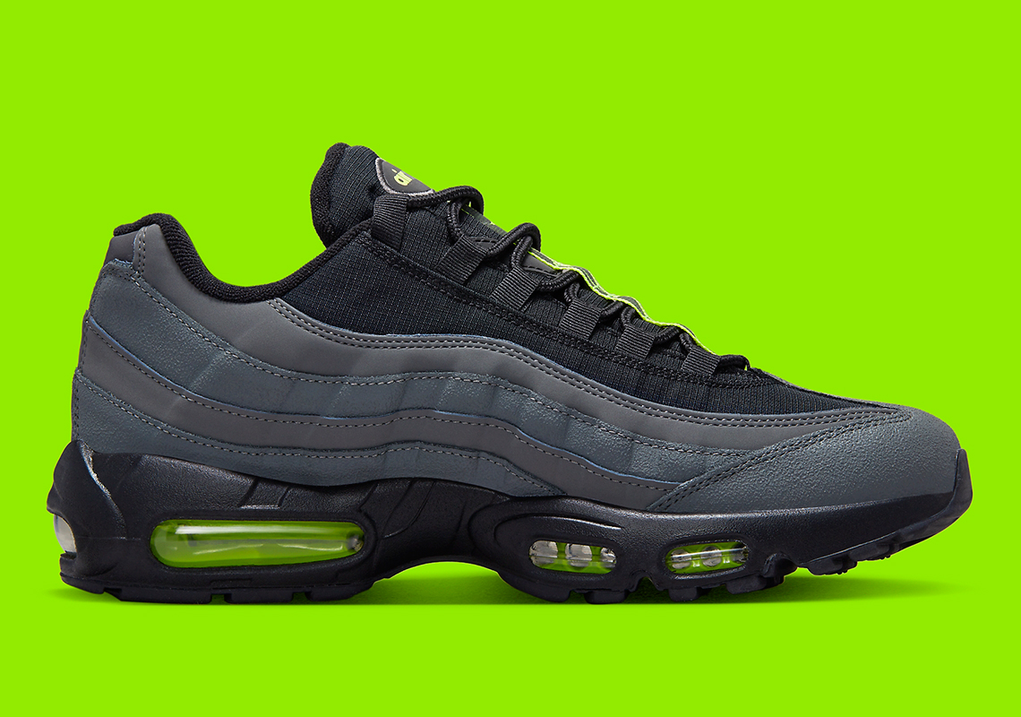 grey and black nike 95