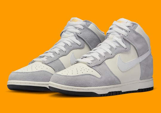 Hits Of Orange Contrast This Nike Dunk High In Grey