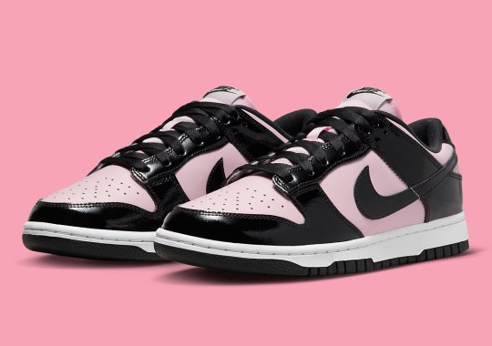 This Nike Dunk Low Essential Layers Black Patent Leather Over A Pink Base