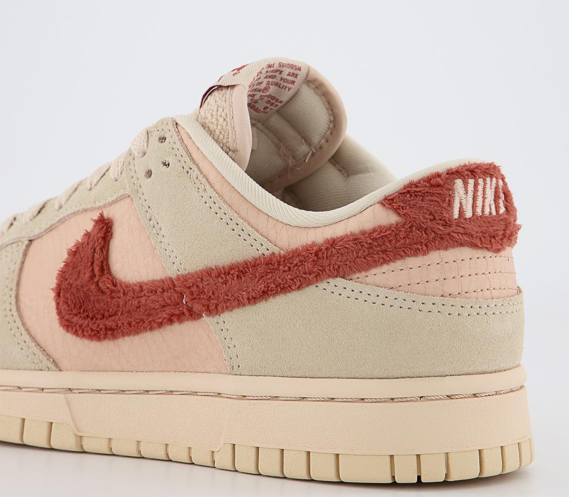 dunk with red toe and brown swoosh