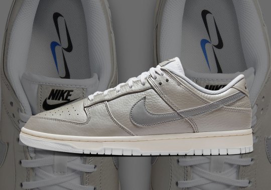 Multiple Swooshes Decorate The Nike Dunk Low “Metallic Silver”