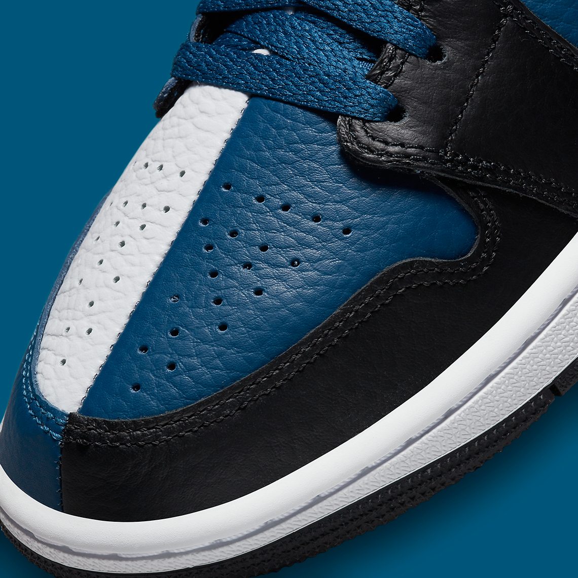 half blue jordan 1 mids