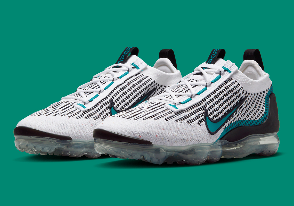 white and teal vapormax