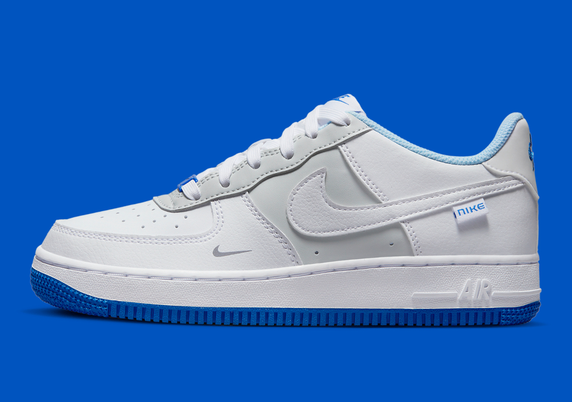 This Kid's Nike Air Force 1 Low Features Various Shades Of Blue