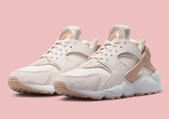 A Metallic Rose Gold Finish Is Applied To This Women’s Exclusive Nike Air Huarache
