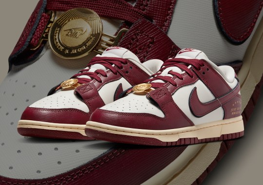 Gold Accessories And “Just Do It” Branding Land On This Regal Nike Dunk Low