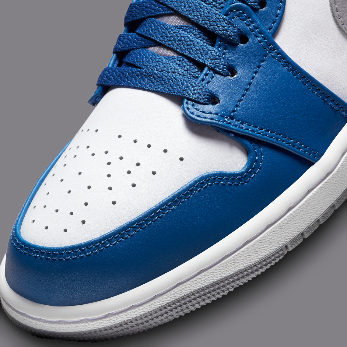 low top jordan ones blue