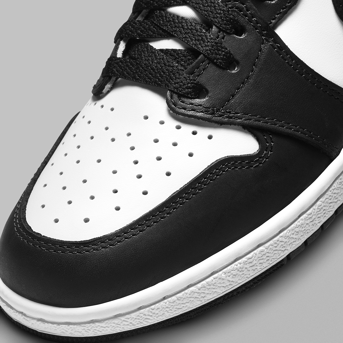 black and white leather jordan 1