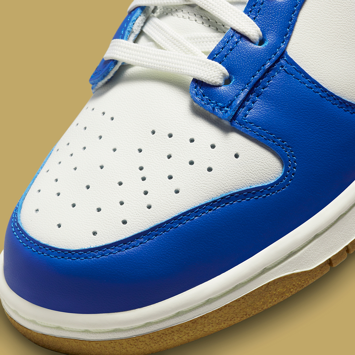 Nike Dunk Low Royal Blue Gold FB7173-141 | SneakerNews.com