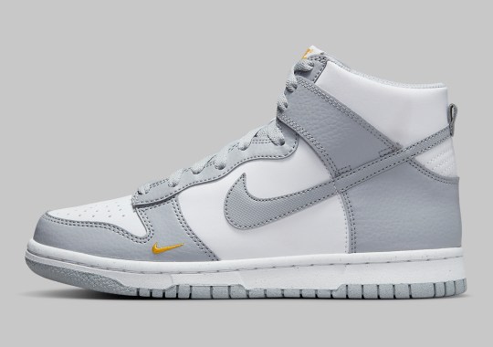 Mini Swooshes Extend A Titular Accent On The Nike Dunk High