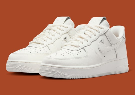 This Clean Nike Air Force 1 Low Features Chrome Tips On Its Profile Swooshes