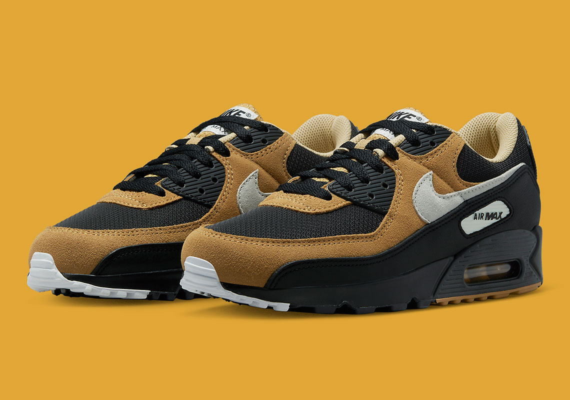 "Elemental Gold" Flaunts Across A Dominantly Black Nike Air Max 90
