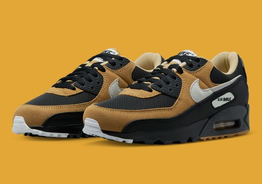 “Elemental Gold” Flaunts Across A Dominantly Black Nike Air Max 90