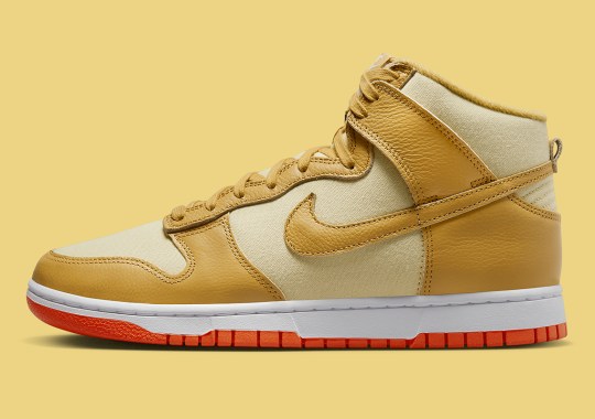A Golden Nike Dunk High Pairs Canvas And Leather