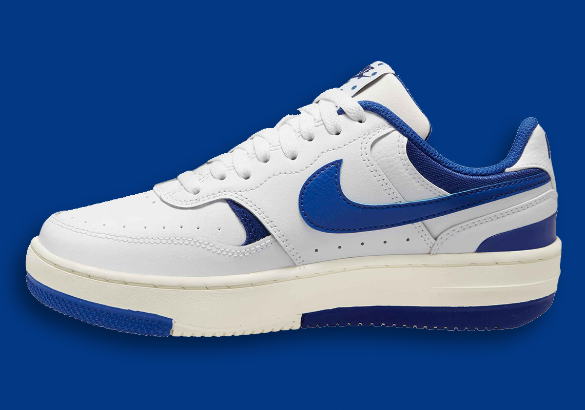 Nike Gamma Force trainers in white and game royal blue