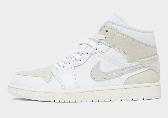 The Air Jordan 1 Mid Indulges In A Crisp White Craft Construction