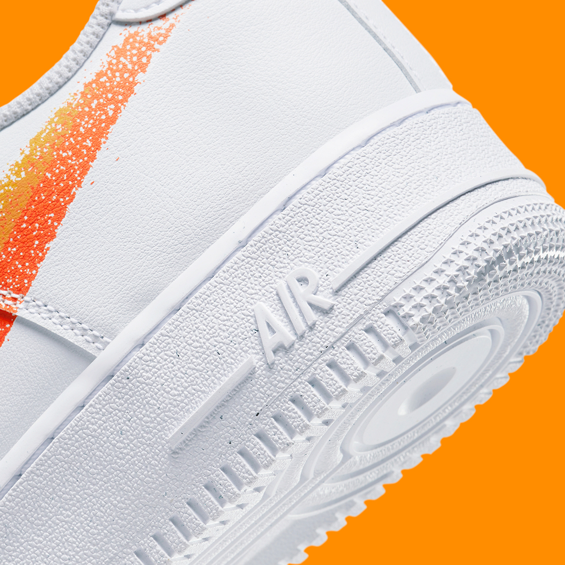 Nike Air Force 1 '07 double swoosh spray trainers in white and orange