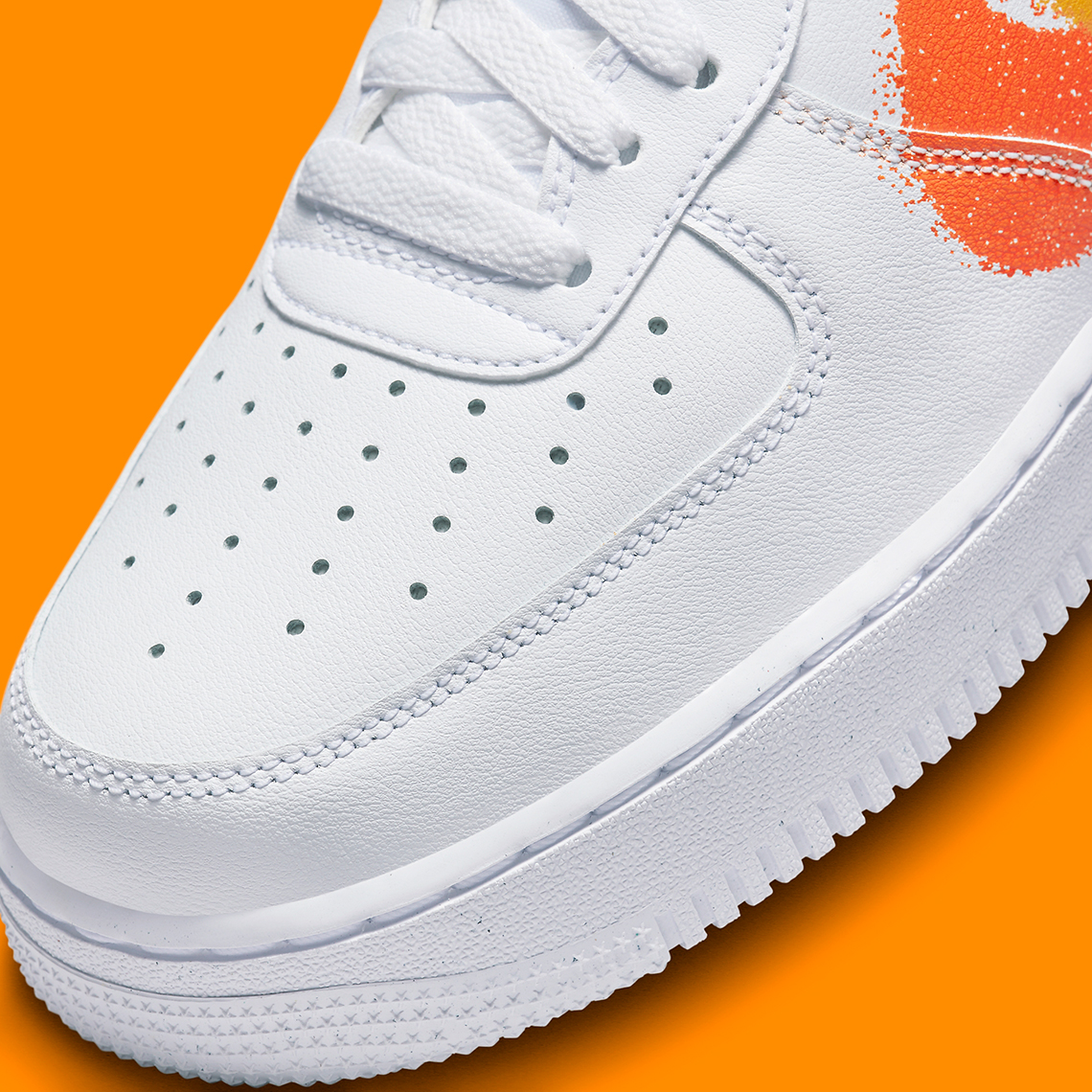 Nike Air Force 1 '07 double swoosh spray trainers in white and orange