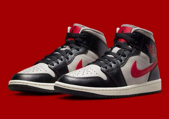 Red Swooshes And Branding Highlight This Otherwise Neutral Air Jordan 1 Mid