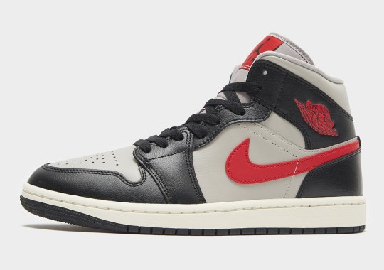 Red Swooshes And Branding Highlight This Otherwise Neutral Air Jordan 1 Mid